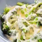 Broccoli in coconut cheese sauce